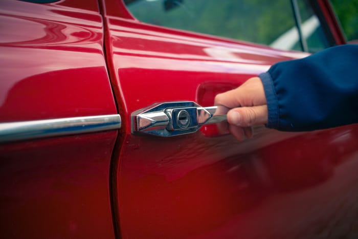 opening a car door